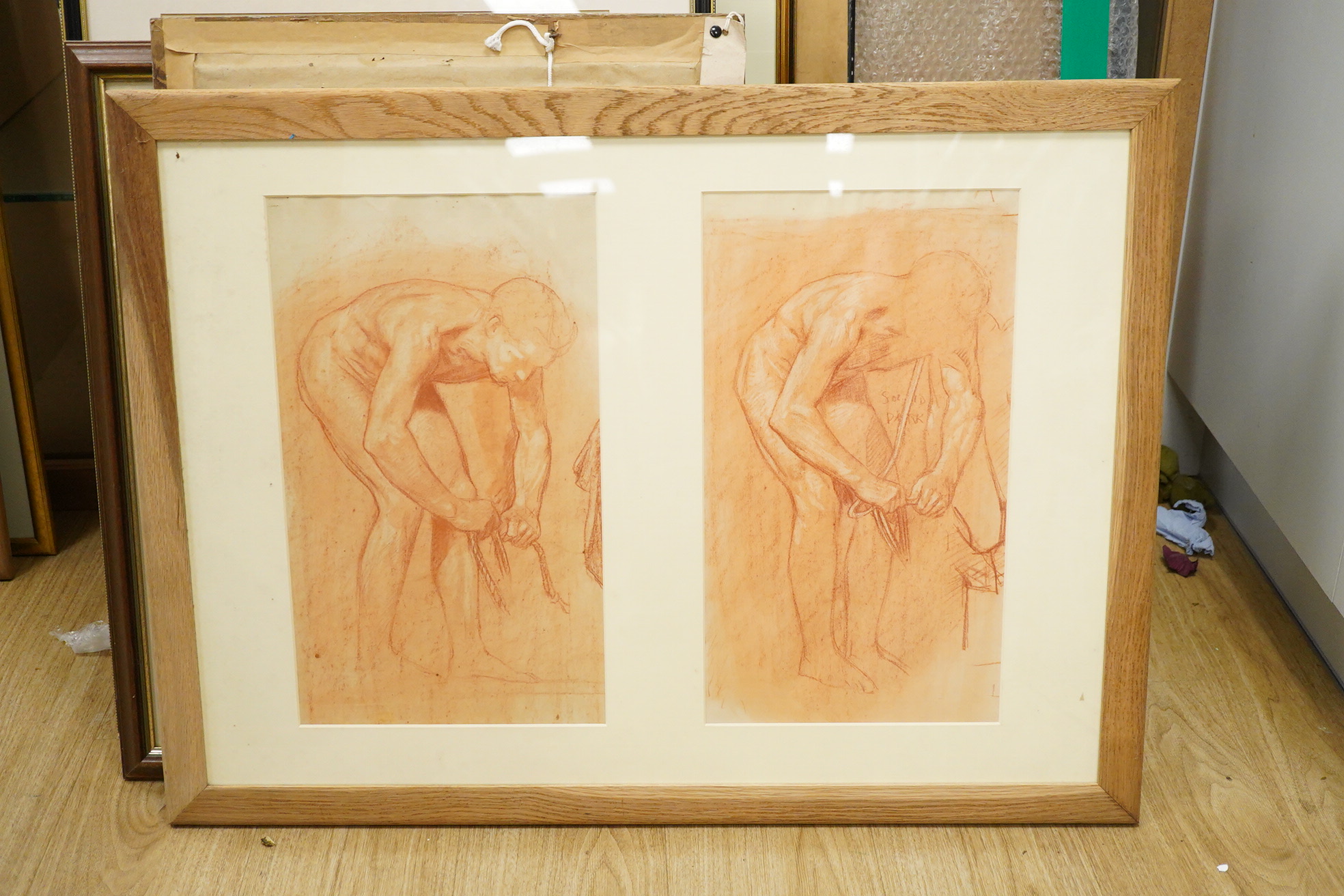 Harry Mileham (1875-1957), Two figural studies, unsigned, pair of sanguine chalks mounted and framed as one, each 45 x 25cm